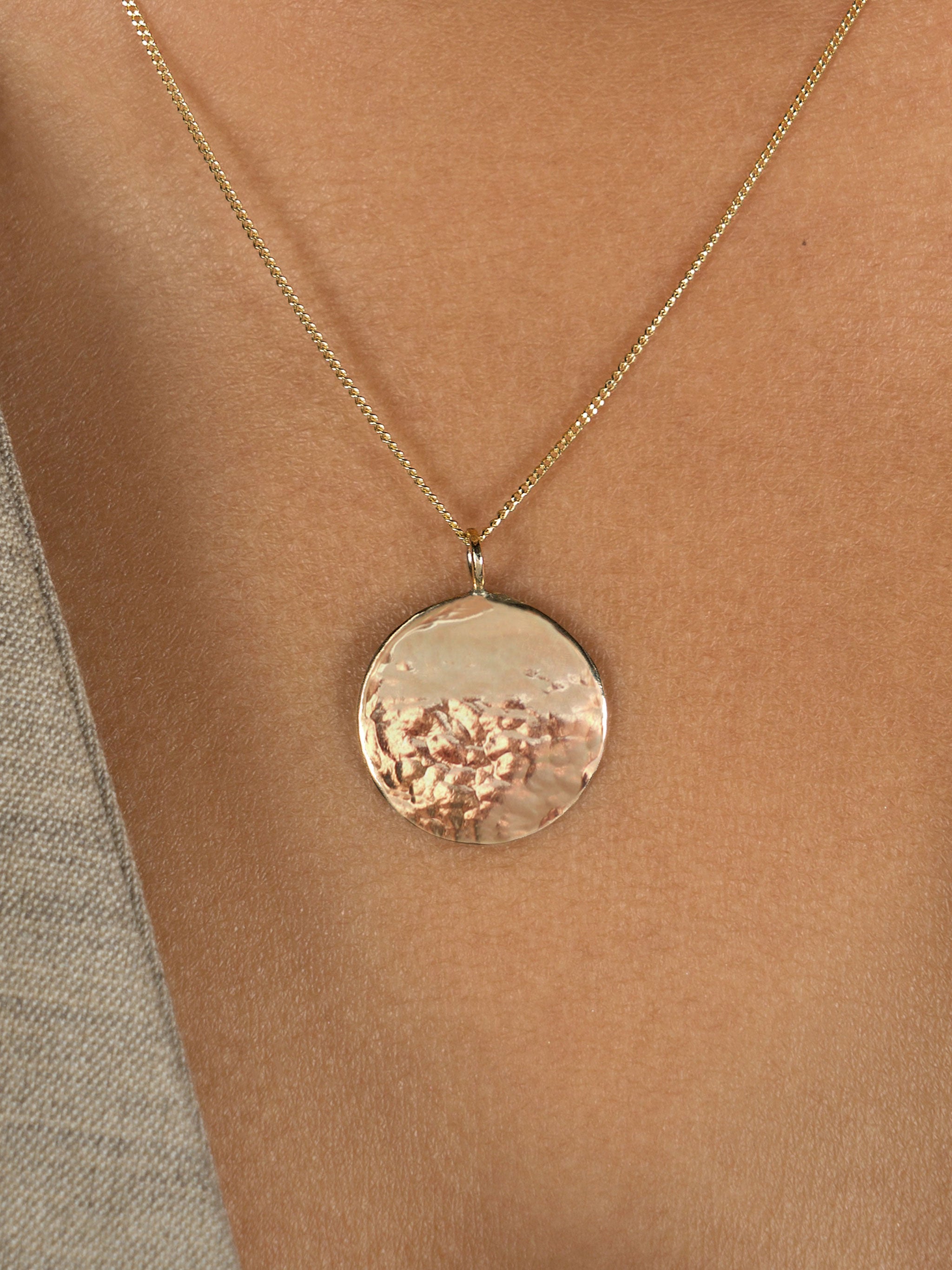 Lavey London's Solid 9ct Gold Hammered Disc Pendant Modelled on a Neck