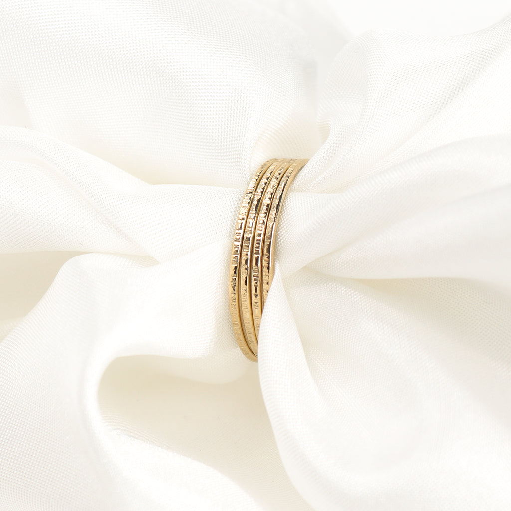 Set of recycled solid 9ct yellow gold hammered stacking rings