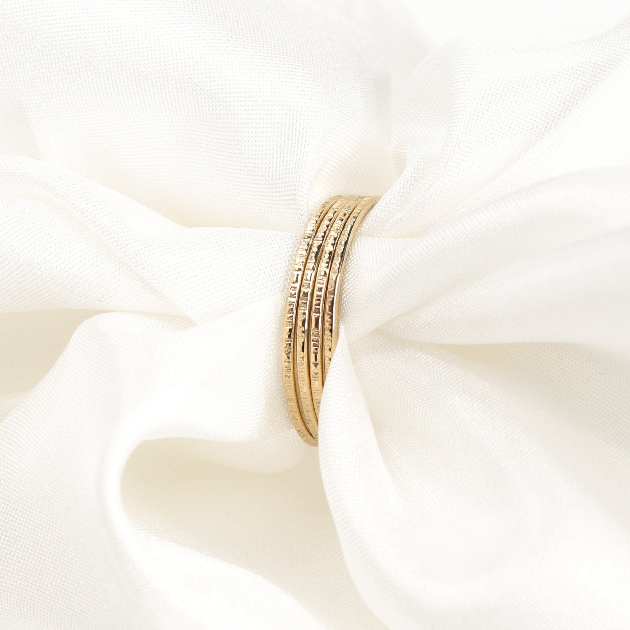 Set of recycled solid 9ct yellow gold hammered stacking rings