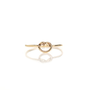 Lavey London's Solid 9ct Gold Love Knot Infinity Ring shown against a white background
